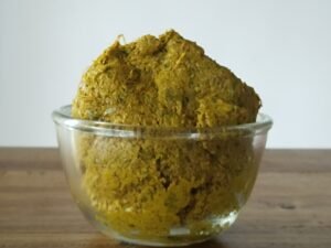 Dharwad Spicy Tokku in a bowl with roasted spices and tamarind pulp