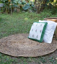 Banana fibre round rug, Eco-friendly round rug, Sustainable fibre rug, Handwoven round rug, Natural fibre round rug, Artisanal round rug, Fair trade round rug, Bohemian round rug, Organic round rug, Ethically sourced round rug,