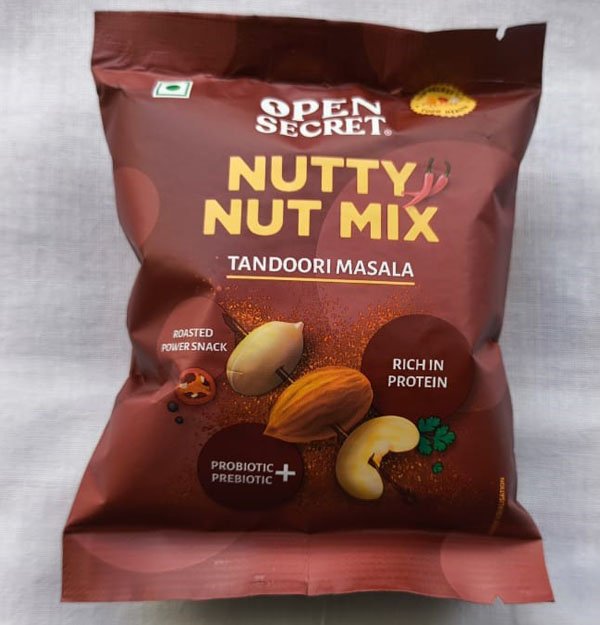 Open Secret Nutty Nut Mix Tandoori Masala Nut Mix snack Healthy tandoori nut mix Buy Open Secret Nutty Mix online Protein-packed nut mix snack Tandoori masala flavored nuts Open Secret healthy nut mix Spicy nut mix for snacking Guilt-free tandoori masala nuts Open Secret nut mix review