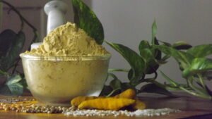 Dharwad Style Homemade Menthe Hittu powder in a bowl with roasted lentils and spices